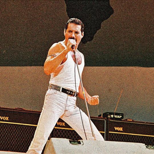 ULY 13: Freddie Mercury of Queen performs on stage at Live Aid on July 13th, 1985 in Wembley Stadium, London, England