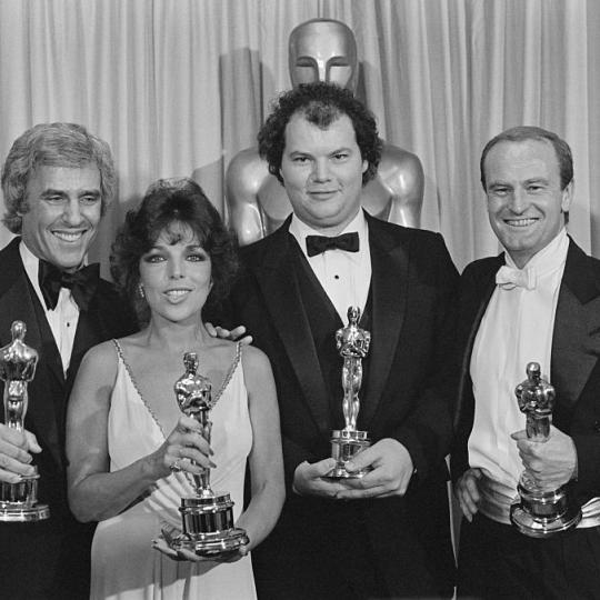 L-R: Burt Bacharach, Carole Bayer Sager, Christopher Cross and Peter Allen win Oscars for "Arthur's Theme (Best That You Can Do)."