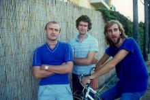 Portrait of the British singer Phil Collins, the British keyboards player Tony Banks and the British bassist and guitarist Mike Rutherford on a bike. They having a role in the British musical band called Genesis. 1981 (Photo by Angelo Deligio/Mondadori via Getty Images)