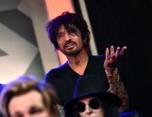 LOS ANGELES, CALIFORNIA - DECEMBER 04: Tommy Lee of M?tley Cr?e speaks during the press conference for THE STADIUM TOUR DEF LEPPARD - MOTLEY CRUE - POISON at SiriusXM Studios on December 04, 2019 in Los Angeles, California. (Photo by Emma McIntyre/Getty Images for SiriusXM)