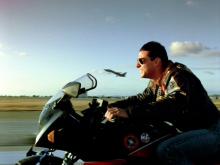 LOS ANGELES - MAY 16: The movie "Top Gun", directed by Tony Scott. Seen here, Tom Cruise as Lt. Pete "Maverick" Mitchell riding a Kawasaki GPZ 900 R. Initial theatrical release May 16, 1986. Screen capture. Paramount Pictures. (Photo by CBS via Getty Images)