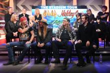 ) Rick Allen, Joe Elliott, Vivian Campbell, Phil Collen, and Rick Savage of Def Leppard, Nikki Sixx, Vince Neil, Mick Mars, and Tommy Lee of Mötley Crüe, and (Front of stage L-R) Bret Michaels, C.C. DeVille, Bobby Dall, and Rikki Rockett of Poison attend the Press Conference with Mötley Crüe, Def Leppard, and Poison announcing 2020 Stadium Tour on December 04, 2019 in Hollywood, California. 