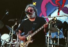 Jerry Garcia of the Grateful Dead performs at the Greek Theatre on August 17, 1988 in Berkeley, California. (Photo by Tim Mosenfelder/Getty Images)