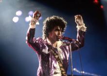 DETROIT, MI - NOVEMBER 4: American singer, songwriter, musician, record producer, dancer, actor, and filmmaker Prince (1958-2016) performs onstage during the 1984 Purple Rain Tour on November 4, 1984, at the Joe Louis Arena in Detroit, Michigan. (Photo by Ross Marino/Getty Images)