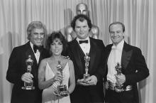 L-R: Burt Bacharach, Carole Bayer Sager, Christopher Cross and Peter Allen win Oscars for "Arthur's Theme (Best That You Can Do)."